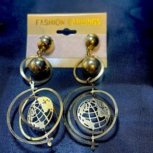 Fashion dangling earrings.